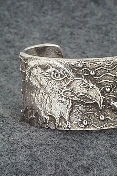 Tufa Cast Sterling Silver Bracelet Navajo - Etsy Symbolic Engraved Sterling Silver Cuff Bracelet, Hand Cast Sterling Silver Bangle, Hand Cast Sterling Silver Bangle Bracelet, Unique Antique Silver Bracelet With Oxidized Finish, Unique Antique Silver Bracelets With Oxidized Finish, Unique Silver Cuff Bracelet With Oxidized Finish, Silver Handcrafted Symbolic Jewelry, Symbolic Silver Jewelry With Hand Cast Details, Symbolic Silver Jewelry With Hand Cast