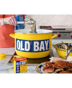 an old bay dish is being prepared on the stove