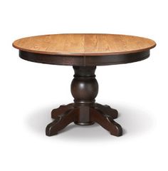 an oval wooden table with two pedestals