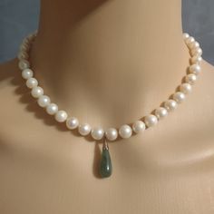 Vintage Genuine Pearl Necklace With Natural Jade Teardrop Shaped Pendant. There Are 44 Pearls At Approximately 6.5 Mm, 14 Karat Gold On Pendant And Clasp Markings Are In Photos. Open Chain Size From Clasp To Clasp Is 15in. This Beautiful Piece Has Genuine Pearls Not Farmed Pearls. Elegant Drop Emerald Necklace For Gift, Handmade Drop Necklaces For Formal Occasions, Elegant Single Strand Round Emerald Necklace, Handmade Formal Drop Necklaces, Formal Handmade Drop Necklaces, Elegant Drop Necklaces With Natural Stones, Elegant Emerald Gemstone Beads Necklace, Drop Emerald Necklace For Formal Occasions, White Teardrop Necklace For Formal Occasions