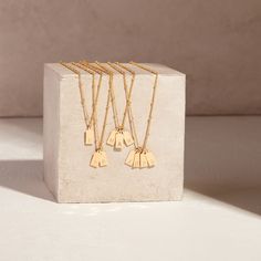 No matter where you are going, deck your neck with our classic Madeline rectangle two initial pendant. We love its modern design and versatility. Rock it alone or as the base of an on-trend layered look. 1/2" x 1/4" gold filled or sterling silver tag Hand stamped initial 16" brass satellite chain with 2" extender Lobster claw closure Made in the USA With customization this item is FINAL SALE NOTE - discs DO NOT slide on and off the chain. If you are looking to add or remove discs from the chain, Modern Personalized Rectangular Necklaces, Modern Personalized Rectangular Jewelry, Modern Everyday Charm Necklaces With Initial Pendant, Modern Everyday Initial Pendant Charm Necklace, Modern Initial Pendant Charm Necklace For Everyday Wear, Modern Everyday Necklace, Modern Everyday Dog Tag Jewelry, Classic Rectangular Initials Necklace, Everyday Personalized Rectangular Charm Necklaces