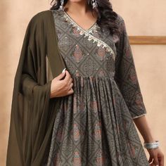 Grey colored suit is prettified with Jaipuri and sequins work as shown which makes it appear classy. This top is made of muslin fabric which is accompanied with santoon bottom and chiffon dupatta. Women can buy this suit to wear for their parties and functions. Note:- The actual product may differ slightly in color and design from the one illustrated in the images when compared with computer or mobile screen. Size Chart Size: Semi Stitched/Unstitched can be altered from maximum to minimum size b Festive Mirror Work Mulmul Palazzo Set, Festive Mulmul Palazzo Set With Mirror Work, Elegant Cotton Sharara With Mirror Work, Festive Mulmul Anarkali Set With Mirror Work, Elegant Cotton Anarkali Set With Cutdana, Diwali Churidar With Mirror Work In Mulmul, Diwali Mirror Work Mulmul Churidar, Diwali Mulmul Churidar With Mirror Work, Anarkali Churidar With Mirror Work In Mulmul