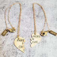 This is a perfect Valentine's day gift for your favorite person! These are TWO beautiful and shiny broken heart necklaces - one is for you, obvi.  They are hand stamped as one heart with PARTNERS IN CRIME in uppercase as pictured or any phrase around 15 characters. When the necklaces are apart, the message on the full necklace isn't clear - which is great for those of us that love to laugh at ourselves.It's the perfect way to celebrate Galentine's day with your girl gang bestie who would totally Customized Jewelry For Valentine's Day Friendship, Customized Jewelry For Friendship On Valentine's Day, Meaningful Jewelry For Best Friend Gift On Valentine's Day, Meaningful Hand Stamped Jewelry For Friendship, Personalized Meaningful Charm Necklaces For Friendship, Personalized Jewelry For Best Friend Gift, Hand Stamped Heart Jewelry For Friendship, Adjustable Charm Necklace For Best Friend On Valentine's Day, Hand Stamped Charm Necklaces For Valentine's Day