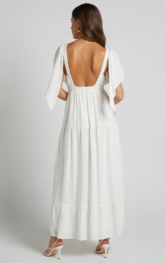 Lyrad Empire Maxi Dress - Waist Textured Dress in White | Showpo USA Vacation A-line Midi Dress With Tie Back, Midi Length Tie Back Dress For Garden Party, Elegant Flowy Sundress For Brunch, Elegant A-line Maxi Dress For Vacation, Flowy A-line Dress For Brunch, Flowy A-line Brunch Dress, Elegant Tiered Maxi Dress For Vacation, Elegant A-line Sundress For Vacation, White Midi-length Dress With Tie Back