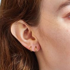 Pick and choose your fave with this double pack of our best-selling mini hoop earrings. It comes in two sizes and is perfect for wearing on its own or to wear in your first, second and/or third earring hole. Also available in Silver. Dimensions: 1st hoop: 6mm (diameter) x 1.6mm; 2nd hoop: 8mm (diameter) x 1.6mm Gold Plated; Stainless Steel. Hypoallergenic Tarnish Resistant Tiny Double Hoop Earrings, Small Gold-plated Clip-on Hoop Earrings, Minimalist Small Hoop Clip-on Earrings, Chic Gold-tone Small Hoop Earrings, Silver 14k Gold-filled Small Hoop Earrings, Earring Hole, Mini Hoop Earrings, Purse Jewelry, Hoop Earring Sets