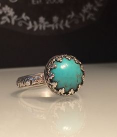 Turquoise ring. Natural Turquoise and a Solid Silver Ring. Artisan turquoise and Sterling silver crown ring. Renaissance Ring. Gift for her. This stunning solid silver and kingman turquoise ring is a size 7 but is available in any size with a very similar stone stone in 3 days. The beautiful natural turquoise stone measures just under 1/4 of an inch or 12mm. This unique yet very versatile ring is sure to be your new go to accessory or makes the perfect gift. ❤️❤️Comes in a Jewelriart Gift box. G Artisan Turquoise Ring Jewelry, Adjustable Spiritual Style Turquoise Cabochon Ring, Adjustable Bohemian Turquoise Promise Ring, Adjustable Spiritual Turquoise Ring, Adjustable Turquoise Healing Ring, Southwestern Style Turquoise Opal Ring Gift, Southwestern Style Turquoise Opal Ring As Gift, Southwestern Turquoise Opal Ring Gift, Bohemian Emerald Adjustable Open Ring