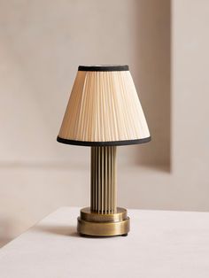 a lamp that is on top of a table