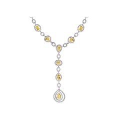 This is one of the premium necklaces in our Bridal collection that is sure to impress. It features 8 solitaire pieces of yellow diamonds that weigh approximately 10 carats, all mounted in 18 karat gold. The yellow diamonds come in different shapes and sizes, which adds to the uniqueness of the necklace. In addition to the yellow diamonds, the necklace also has approximately 4 carats of small round cut diamonds that surround them. These white diamonds add to the overall beauty and elegance of the Exquisite Diamond Necklace Hallmarked, Luxury Diamond Cut Diamond Necklace, Exquisite Diamond Drop Necklace For Formal Occasions, Exquisite Drop Diamond Necklace For Formal Occasions, Luxury Yellow Gold Necklace With Brilliant Cut, Luxury Yellow Gold Necklaces With Brilliant Cut, Luxury Diamond Bridal Necklace With Gemstone, Luxury Hallmarked Pear-shaped Jewelry, Luxury Brilliant Cut Drop Jewelry