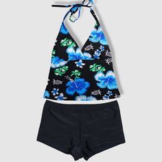 Two piece tying halter tankini top set - black with blue hibiscus, green leaves, and white turtles and fish pattern with black shorts. Padding inserts included. Made of 80% nylon and 20% spandex. Lining is 100% nylon. Designed and shipped from Hawaii and made in Vietnam. Colors may vary from picture depending on cut of fabric. Black Tankini For Summer Surfing, Tropical Stretch Tankini With Halter Neck, Tropical Print Halter Top For Swimming, Hawaiian Halter Neck Tankini For Pool, Tropical Stretch Halter Neck Tankini, Tropical Halter Neck Stretch Tankini, Blue Tropical Print Tankini For Vacation, Black Tropical Print Swimwear For Vacation, Hawaiian Halter Neck Tankini For Swimming