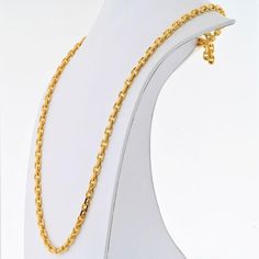 Witness the marriage of heritage and innovation in the Boucheron 18K Yellow Gold Link Chain 35 Inches Necklace, a masterpiece of timeless elegance and opulent design. This statement necklace is more than just an accessory; it's a symbol of sophistication and luxury that transcends trends and styles. Crafted meticulously from 18K yellow gold, every link in this chain tells a story of expert craftsmanship and attention to detail.Measuring an impressive 35 inches in length, this necklace offers versatility in how it can be styled and worn, making it a versatile addition to any jewelry collection. The substantial weight of 161 grams adds a sense of substance and presence, ensuring that this piece makes a statement wherever it's worn.The link chain design speaks volumes about Boucheron's legacy Gold Link Chain, Luxury Necklace, Gold Link, Link Chain Necklace, Chain Design, Metal Necklaces, Chain Link Necklace, Estate Jewelry, Link Chain