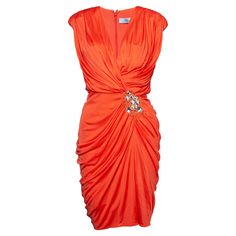 Blumarine, Orange draped dress with crystal embellishments. The item is in very good condition. Dress has shoulderpads. • CONDITION: very good condition • SIZE: IT44 - M • MEASUREMENTS: length 97 cm, width 41 cm, waist 34 cm • MATERIAL: 100% viscose / rayon - 96% silk 4% elastan • CARE: dry cleaning • COLOR: orange Awards Dress, Orange Drapes, Cute Dress Outfits, Viscose Rayon, Chanel Vintage, Draped Dress, Dress For Sale, Vestidos De Noche, Cute Dress