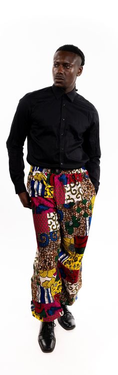 PRODUCT DETAILS: Designed in the U.S., hand-crafted in Africa Delivery within 2 weeks Multiple prints available These medium-rise African print pants are designed with African fabric. They feature a fitted design to embrace your silhouette with comfortable material. The straight-legged pants sit securely below the waist and are tight at the ankles for a stylish look. Look for the perfect color to match your next event and show off a casual finesse. Can be worn as evening wear to various events s Casual Wide Leg Pants With Abstract Print, Casual Fitted Bottoms With Abstract Print, Casual Wide Leg Pants With Bold Print, Stretch Cotton Printed Pants, Stretch Cotton Pants With Print, Multicolor Printed Cotton Bottoms, Multicolor Printed Straight Leg Pants, Fitted Harem Pants With Tapered Leg And Elastic Waistband, Fitted Tapered Leg Harem Pants With Elastic Waistband