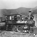 black and white photograph of an old steam train