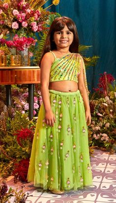 Mint Green Baby Lehenga Set. One-shoulder top and attached dupatta adorned with reflective crystals and sequins. Let your little darling shine in this enchanting ensemble." Colour: Mint Green Fabric: Tulle Technique: Hand Embroidery No of set: 2 Delivery Time: 7-8 weeks Washcare: How to Store your Papa Don’t Preach Garments ? The garments should be stored in the original garment bags, coverings and pouches provided. Embroidered garments should be stored in a ventilated space, and not in stuffed Baby Lehenga, Mint Green Fabric, Kids Party Wear Dresses, Kids Party Wear, Shirt Jacket Men, Air Ventilation, Drape Saree, How To Store, Green Baby