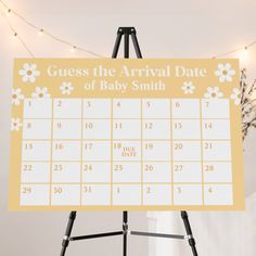 a sign that says guess the arrival date of baby smith