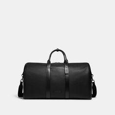 A bag as distinct as its namesake city the Gotham is a sleek streamlined style designed for travel. A no-fuss carryall this generously-sized (TSA compliant) Duffle features interior zip and slip pockets for easy organization and a convenient exterior pocket for access to essentials. Crafted of refined leather and textured pebble leather it’s secured by a zip closure and finished with a detachable strap for shoulder or crossbody wear. | Coach Gotham Duffle Bag - Black Copper/black Luxury Tote-style Luggage With Zipper Closure, Luxury Tote Luggage With Zipper Closure, Classic Tote Travel Bag For Business Trips, Business Leather Luggage With Double Handle, Sleek Rectangular Bags For Business Trips, Sleek Rectangular Bag For Business Trips, Classic Business Travel Bag With Leather Handles, Classic Tote Weekender Bag For Business Trips, Elegant Duffle Bag With Zipper Closure For Travel