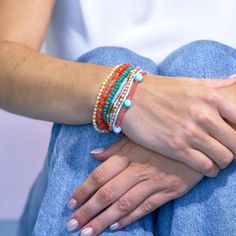 Crafted for the free-spirited goddess who craves a touch of seaside magic, this stack of 8 bracelets is a celebration of colors that dance like a Mediterranean sunset. Each bracelet is a canvas of textures, designed to transport you to the dreamy landscapes of the Amalfi Coast. This stack is a sensory journey, inviting you to run your fingers along the vibrant palette, just like dipping your toes in the Amalfi waves. Individual bracelet strands may vary slightly. --DETAILS-- Handmade by skilled artisans in India These accessories are made by human hands. A slight variation in size and color is considered part of the beauty of these one-of-a-kind pieces. To extend the life of your accessories, store them in a dry place while swimming, showering, or working out. Original design copyright INK Bohemian Stackable Bracelets For Festival, Bohemian Bangle Stretch Bracelet For Summer, Turquoise Bohemian Braided Bracelets For Summer, Bohemian Turquoise Stretch Bracelet For Summer, Turquoise Bohemian Stretch Bracelet For Summer, Turquoise Bohemian Stretch Bracelet For Vacation, Handmade Coral Bracelets For Summer, Bohemian Red Beaded Bracelets For Vacation, Coral Bracelet For Summer Gift