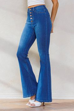 A pair of ultra-high-waisted flare jeans featuring contrast button-up front, two faux front pockets and double back patch pockets. Medium stone High waist Contrast button 67.7% Cotton, 24% Modal, 7% T400, 1.3% Lycra Care Instructions: Machine wash High Waisted Flare Jeans, High Waisted Flares, Back Patch, Flare Jeans, Patch Pocket, Care Instructions, High Waist, Button Up, High Waisted