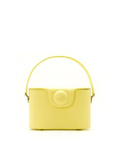 Perfect balance between vintage, classic, and contemporary styles. Inspired by 2001: A Space Odyssey. Cowhide leather material. Available as handbag and shoulder bag. Adjustable and detachable shoulder strap. Magnetic snap closure. Designed by A.Cloud. Modern Yellow Bag With Top Carry Handle, Modern Yellow Bags With Top Carry Handle, Modern Satchel Box Bag With Detachable Handle, Modern Box Bag With Detachable Strap And Double Handle, Classic Shoulder Bag With Top Handle And Adjustable Handle, Evening Yellow Double Handle Satchel, Evening Yellow Satchel With Double Handle, Yellow Evening Satchel With Double Handle, Box Bag With Round Handle For Shopping