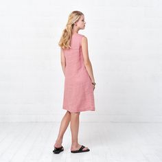 "This is summer pink wrap dress with comfy, loose silhouette and ribbon tie. You are the one who decides the tightness or looseness of a dress, you can regulate it with a tie in the middle. That's why this dress will be suitable for any body shape women. Dress is also perfect for pregnant women, who love to feel feminine and beautiful. Adding breathable, organic linen fabric into the mix only makes this dress even more better and ideal for hot summer day. Two hidden side pockets, midi length and Sleeveless Summer Wrap Dress With Tie Back, Sleeveless Pink Wrap Dress For Spring, Pink V-neck Linen Dress For Beach, Pink Linen Summer Dress For Daywear, Pink Linen Dress For Summer Daywear, Feminine Pink Linen Summer Dress, Feminine Summer Wrap Dress, Sleeveless Pink Linen Dress For Summer, Pink Sleeveless Linen Dress