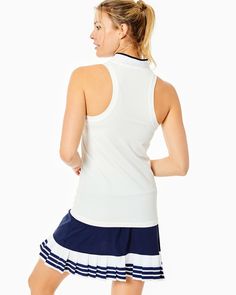 Sleeveless Courtside Polo- Final Sale Fitted Sleeveless Tennis Tops, Casual Sleeveless Tops For Tennis, Sporty White Tank Top For Spring, Sleeveless Summer Tennis Tops, Sleeveless Tennis Tops For Summer, Sleeveless Tops For Summer Tennis, Casual Sleeveless Tank Top For Tennis, White Stretch Tennis Dress For Gym, White Fitted Tennis Top