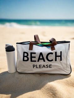 Beach bag with Beach Please printed on the front in black Large Capacity Beach Tote Canvas Bag, Large Capacity Canvas Tote Bag For Beach, Large Capacity Tote Canvas Bag For Beach, White Coastal Beach Bag For Vacation, White Coastal Style Bags For Beach, White Summer Canvas Beach Bag, White Canvas Bag For Beach Vacation, White Canvas Bag For Vacation During Beach Season, White Large Capacity Canvas Bag For Weekend Trips