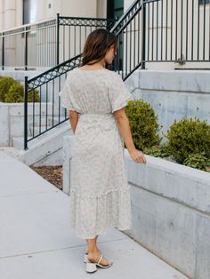 Looking for a dress that will make you stand out in a crowd? Look no further than the Floral Pattern Whitney Dress in mint floral! This dress is all about fun and flirty style, with a colorful floral print that's sure to turn heads. But it's not just about looks - this dress is designed to flatter your curves, with a tie waist that accentuates your figure. And with flutter sleeves and a midi length, it's the perfect combination of playful and sophisticated. Whether you're headed to a wedding, a Maxi Length Ditsy Floral Sundress For Day Out, Ditsy Floral Print Maxi Sundress For Day Out, Modest V-neck Floral Print Dress, Floral Print Midi Sundress For Daywear, V-neck Dress With Ditsy Floral Print For Garden Party, Casual Spring Maxi Dress With Ditsy Floral Print, Knee-length Floral Print Sundress For Brunch, Floral Print Knee-length Sundress For Brunch, Summer Ditsy Floral Print Midi Dress