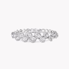 Pear shape, round, and openwork pavé diamonds tell a story of nature’s beauty within this Peony diamond bracelet. Each arrangement of stones represents the petals of a peony flower as it blooms with romantic elegance. This captivating white gold and diamond bracelet forms part of our Classic Graff collection, timeless jewels that celebrate our reputation for the world’s most exquisite diamonds. A timeless Peony diamond bracelet with a total approximate weight of 7.26 carats. Graff Jewelry, Diamond Shaped Engagement Ring, Gold And Diamond Bracelet, Rare Diamonds, Graff Diamonds, Round Diamond Pendant, Rare Diamond, Bracelets Diamond, Diamond Earrings Studs Round