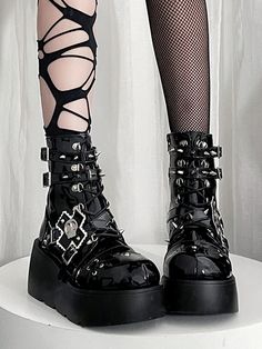 Get ready to rock the punk look with these edgy platform boots. Featuring spike studs , leather buckles, and a chunky heel, these boots are the perfect statement piece for your alternative wardrobe.  Please note that this product includes only one pair of shoes.  Garment Size   	 		 			Size 			35 			36 			37 			38 			39 			40 		 		 			Foot Length 			22.5 			23 			23.5 			24 			24.5 			25 		 		 			Heel 			4.5-7.5 			4.5-7.5 			4.5-7.5 			4.5-7.5 			4.5-7.5 			4.5-7.5 Edgy High-top Chunky Platform Boots, Alternative Leather Platform Boots With Buckle Closure, Punk Platform Boots With Grommets, Punk Platform Boots With Grommets For Alternative Fashion, Edgy Platform Boots With Buckle Closure And Round Toe, Gothic Platform Boots With Grommets, Punk High Ankle Platform Boots With Buckle, Punk Spiked Platform Boots For Concerts, Punk High Ankle Chunky Platform Boots