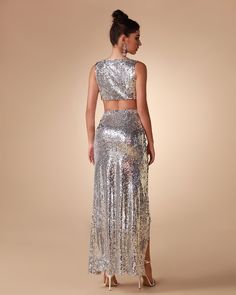 Unleash your inner diva with our Argent Sequin Two Piece Set. Featuring a glittery and glamorous sequin fabric, this two piece ensemble is perfect for making any night out extra special. Cut in a sleek silhouette, it's designed to flatter every figure and bring out your best look. Our Style No.KLYF823 Bead Piece Height - 68.9"/175cm Bust - 34.6"/88cm Waist - 25.6"/65cm Hips - 36.6"/93cm and wears size S About Wholesale/Dropshipping, please contact us! Note: Colour may vary due to lighting on ima Glamorous Festive Sequin Dress For Night Out, Glamorous Embellished Sequin Fabric For Prom, Glamorous Mini Dress With Contrast Sequin, Glamorous Sparkling Sequin Fabric For Gala, Glamorous Embellished Sequin Fabric For Evening, Glamorous Sequin Fabric For Gala And Festive Occasions, Glamorous Embellished Sequin Fabric For Night Out, Glamorous Embellished Sets For Party, Glamorous Embellished Sets For Party Season