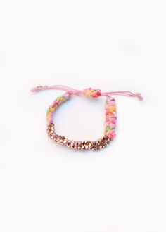 "Rose Gold Cluster Nugget Bracelets are handmade in New York City with Pink Bandana. Prasada in Sanskrit means \" God's blessing\". Nugget is a symbol of good fortune. Prasada bracelet is a nice gift with a great intention for yourself and your beloved. Meanwhile, it adds a romantic bohemian touch to your wrist to complete a casual chic look. The length of the bracelet is adjustable." Adjustable Spiritual Bracelets For Festivals, Pink Hand-strung Jewelry For Festival, Adjustable Pink Jewelry For Festivals, Hand-strung Pink Jewelry For Festivals, Adjustable Pink Braided Bracelet With Colorful Beads, Spiritual Pink Adjustable Stretch Bracelet, Spiritual Adjustable Pink Stretch Bracelet, Multicolor Jewelry With Sliding Knot For Gift, Adjustable Bracelet With Round Beads For Festive Occasions