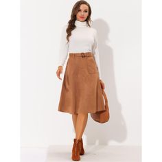 Bring a classic fall vibe to smart casual ensembles with this beautifully a-line belted skirt. Updating your wardrobe with this faux suede pocket skirt which features an A-line silhouette for a universal body shape. Merging feminine and modern styles, this skirt is made of stretchy faux suede, which is comfortable and chic for the fall/winter season. Matching timeless knitwear, a blouse, and retro leather boots or high heels for a smart feminine impression. Midi Skirt With Belt, Aline Midi Skirt, Timeless Knitwear, Midi Skirt Casual, Belted Skirt, Faux Leather Midi Skirt, Midi Skirt With Pockets, Pocket Skirt, Skirt With Belt