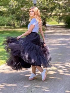 This Black dance skirt is an absolute must-have for any fashion-forward woman! The vibrant colors and comfortable fit make it ideal for any occasion. Whether you're hitting the road or enjoying a picnic in the park, this skirt is sure to turn heads. Black Ruffled Tulle Skirt crafted from 100% cotton base fabric and adorned with two layers of black tulle ruffles. The waistband features a soft and comfortable elastic, making it suitable for extended wear. Elevate your wardrobe with this unique tulle skirt, adding a touch of style and grace to your look. Perfect for special occasions and everyday wear. **The model in the picture is 170 cm tall and is wearing a skirt in size S US, with a length of 95 cm. The skirt is easy to care for, as it can be machine washed and ironed to your liking, ensu Black Tulle Skirt For Fall, Spring Black Tulle Skirt, Black Tulle Skirt For Spring, Black Tiered Tulle Skirt, Black Tulle Bottoms For Night Out, Black Stretch Tulle Skirt, Black Tiered Skirt For Fall, Black Flared Tulle Maxi Skirt, Chic Black Tulle Maxi Skirt