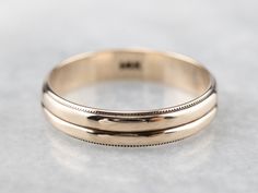 Crafted of polished 14 karat yellow gold, this double-row band features a simple milgrain edge and a timeless style. Unisex and ready to wear or gift! Metal: 14K Yellow Gold Width of Band: 4.1 mm Height off Finger: 1.3 mm Ring Size: 7.50 Marks: "14K" Stamped on the inside band Stacking Bands, Cameo Ring, July Birthstone, Gold Band, Ring Size 7, Hand Engraving, Eternity Bands, Gold Style, Gold Bands