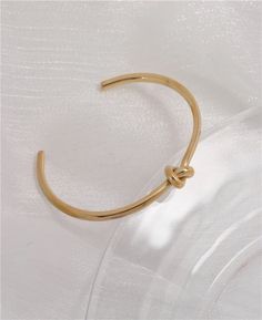 Minimalist Gold Knot Cuff Bracelet, Gold Cuff Bracelet, Gold Tie Knot Bracelet, Gold Minimalist Cuff, Gold Minimalist Bracelet, Gold Stacking Bracelet, Bridesmaid Bracelet, Bridesmaid Jewelry, Bridesmaid Gift, Ready to Ship, Tie the Knot Gift✦ 18k gold plated no tarnish water proof ✦ Size: Approximately 2.25 inches inner diameter ✦ Inner Circumference (wrist): ~6.5" inner circumference ✦ 3mm thick Adjustable Minimalist Metal Cuff Bracelet, Adjustable Dainty Cuff Bangle Bracelet, Adjustable Metal Bangle In Minimalist Style, Adjustable Minimalist Cuff Bracelet, Adjustable Minimalist Round Cuff Bracelet, Adjustable Minimalist Metal Bangle, Simple Adjustable Bracelet Bangle, Adjustable Bangle Bracelet With Simple Design, Simple Adjustable Bangle Bracelet