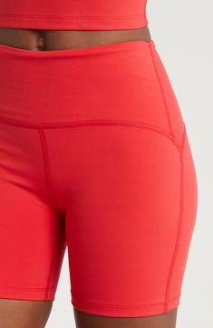 Sleek and stretchy fabric makes these bike shorts motion-friendly must-haves for the studio and beyond. 5" inseam; 16" leg opening; 12" front rise; 13" back rise (size Medium) Pull-on style 75% polyester, 25% elastane Machine wash, tumble dry Made in the USA of imported fabric Sporty Red Biker Shorts With Built-in Shorts, Red Athleisure Activewear With Built-in Shorts, Red Activewear With Built-in Shorts, Red Fitted Activewear With Built-in Shorts, Red Micro-elastic Yoga Pants For Workout, Micro-elastic Red Leggings For Yoga, Red Compression Functional Leggings, Red Compression Leggings, Red Compression Yoga Pants With Moisture-wicking