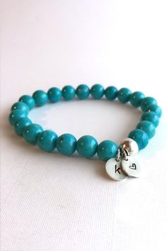 Initial Bracelet, Aqua Blue Beaded Jewelry, Letter Charm Stone Stretch Bracelet on Etsy Adjustable Polished Beads Charm Bracelet Gift, Hypoallergenic Turquoise Round Beads Bracelets, Turquoise Bracelet With Polished Beads As Gift, Turquoise Stretch Bracelet As Gift, Turquoise Stretch Bracelet As A Gift, Polished Beads Charm Bracelet As Gift, Personalized Turquoise Beaded Bracelets, Hypoallergenic Turquoise Stretch Bracelet Gift, Personalized Turquoise Bracelets For Gift