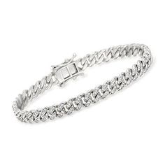 Ross-Simons - 1.40ct t.w. Pave Cubic Zirconia Cuban-Link Bracelet in Silver. 7.5". Get the look for less! Always a fabulous choice, this ultra-style Cuban-link bracelet shines with 1.40 ct. t.w. pave CZs in polished sterling silver. Wear it solo or mixed with a few other favorites for an ample, eye-catching look on the wrist. Double-latch safety. Box clasp, CZ Cuban-link bracelet. CZ weights are diamond equivalents. Classic White Gold Cuban Link Bracelet With Diamond Accents, Elegant Iced Out Sterling Silver Bracelet With Cubic Zirconia, Iced Out Sterling Silver Elegant Bracelet, Elegant Silver Cuban Link Bracelet With Diamond Cut, Elegant Cuban Link Bracelet In Cubic Zirconia For Anniversary, Elegant Cuban Link Bracelet With Cubic Zirconia For Anniversary, Classic Cuban Link Bracelet With Diamond Accents, Elegant Silver Cuban Link Bracelet For Anniversary, Elegant White Gold Cuban Link Bracelet With Cubic Zirconia