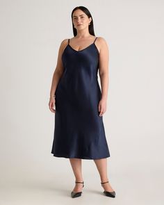 We love the midi length and bias cut of this dress. This super flattering fit is made from 100% mulberry silk, in a satin finish, and is now available in extended sizes. The kicker? Our silk is washable. Easy to style, easy to wash for low-maintenance luxe. Plus, silk fiber contains 18 kinds of amino acids that make it amazing for skin nourishment, hypo-allergenic, and naturally thermoregulating to help maintain body temperature.Also offered in sizes XS-XL. Silk V-neck Bias Cut Slip Dress, V-neck Slip Dress For Bedtime, V-neck Bias Cut Slip Dress For Sleep, Modal Satin V-neck Slip Dress For Sleep, Solid Camisole Slip Dress With Built-in Bra, Silk Cami, Quarter Zip Sweater, Silk Slip Dress, Silk Slip