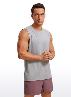 Sleeveless Shirts uses brushed high-end fabric, which features soft, stretchy and moisture wicking. Engineered for comfort. Wide shoulder tank tops, athletic crew neck and split hem are designed for moving freely. Feature & Fitting: 
 Design for workout and training 
 Wide strap tank and split hem 
 Classic fit, crewneck design 
 Fabric: 
 Silky-soft, lightweight, brushed 
 Stretchy, highly 4-Way stretch 
 Matte style, moisture wicking 
 90% Polyester, 10% Elastane 
 SKU : N015 .Easy reach b Mens Workout Tank Tops, Yoga Men, Men's Workout, Crz Yoga, Silver Mist, Crewneck Design, Polka Dot Shorts, Gym Tops, Yoga For Men