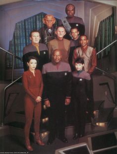 the crew of star trek pose for a group photo