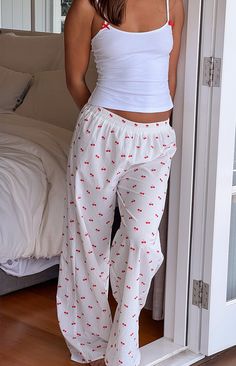 White Cherry Printed Pyjama Pants

How to style:
Cosy up in comfort with our Alexea Cherry Print Pajama Pants! Featuring the most adorable cherry print and made in a super soft lightweight material, these pj pants are perfect for lounging ()! Complete the look with the matching pj shirt or a white tank and sleep () in style.

Features:


  
 * Elasticated waistband with lots of stretch
 
 * Cherry print design
 
 * Unlined
 
 * Lightweight material
 
 * Mid rise fit
 
 * Wide leg
 
 * Little to Pj Fits, Matching Pj Pants, Floral Loungewear, Cute Pj Sets, Tru Fru, Cherry Fashion, Job Outfits, Pyjama Pants, Dream Wishlist