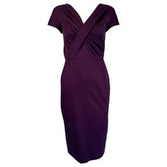 Christian Dior Paris aubergine V neck pleat draped bodice sheath dress. Aubergine silk dobby weave fabric, the bodice features a v wrap neckline with pleats and cap sleeves. A seamed waist and a pencil slim skirt with a center hem back vent makes this classic sheath dress perfect for any special occasion. Lined in purple silk, closes at the back with a zipper & hook & eye at the top. The photo with the label is closer to the actual colour, which is a dark eggplant. Fits like a size 2. In excellent wearable condition. All our clothing is dry cleaned and inspected for condition and is ready to wear. Any condition issues will be noted. For visual comparison our mannequin is a size 4. Please check the measurements provided below and compare with your own measurements for the best possible fit! Luxury Silk Knee-length Evening Dress, Luxury Purple Dola Silk Dress, Purple Silk Bias Cut Dress, Luxury Purple V-neck Midi Dress, Luxury Purple V-neck Mini Dress, Classic Sheath Dress, Christian Dior Paris, Draped Bodice, Dior Paris