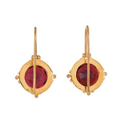 Garnet Vermeil 14K Gold Over Sterling Silver Earring 925 Silver = 4.40 gm. Garnet = 8.10 ct. Garnet is the birthstone for January and is a symbol of friendship. The beautiful earring measures to be 1 inches long including the wire and 0.65 inches wide at its maximum points. The earrings have been made by a team of highly trained and skilled artisans. What is Vermeil 14K Gold? It is a thick layer of 14K Gold plating on 925 Sterling Silver. If for any reason you are not completely satisfied, you m Gold Ruby Round Earrings, Yellow Gold Sterling Silver Earrings With Bezel Setting, 14k Gold Bezel-set Drop Earrings, Classic Gold Ruby Earrings, Yellow Gold Sterling Silver Earrings With Round Stone, Yellow Gold Plated Birthstone Earrings, 14k Gold Bezel Set Drop Earrings, Gold Birthstone Round Earrings, 14k Gold Gemstone Round Earrings