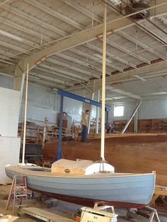 a boat is being built in a building