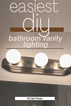 the bathroom vanity light has three bulbs on it