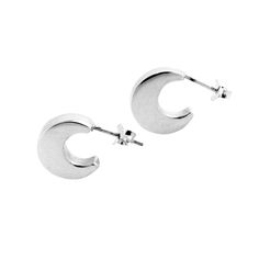 Moon Hoop Earrings, Made of .925 sterling silver. Polished finish. Studs feature a stellar eclipsed moon. Post is at the top of earring. Solid .925 Sterling Silver. Gorgeous modern hoop. Small to medium size classic hoop. Measurements: .80 inch length Material: 925 sterling silver Moon Earrings Studs Sterling Silver, Solid 925 Sterling Silver, Medium Size, Hoop Earrings, 925 Sterling Silver, Stud Earrings, Moon, Sterling Silver, Silver