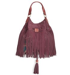 Cascading fringe lends boho-inspired, fashion-forward appeal to this suede hobo by Sam Edelman. 12"W x 11"H x 6"D Interior features lining, 1 zip pocket and 2 slip pockets 9"L handle Drawstring closure Exterior features silver-tone hardware, fringe detail, tassel and feet Silhouette is based off 5'9" model Suede Imported Chic Fringe Bags For Fall, Chic Brown Fringe Hobo Bag, Chic Fringe Hobo Bag For Travel, Chic Brown Hobo Bag With Tassels, Chic Travel Hobo Bag With Fringe, Casual Suede Bags For Fall, Burgundy Bags For Fall, Trendy Fringe Bags For Fall, Bohemian Fringe Shoulder Bag For Shopping