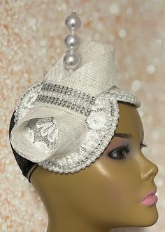 Simple, yet elegant. White Sinamay flower lace Fascinator half hat trimmed with pearls, rhinestones, and bow. The hat is affixed to the head via a hatstring. The hat measures approximately 9.5 inches X 5 inches. PLEASE NOTE All items for Free Shipping will be shipped via USPS First Class Mail.Gifts for mom, sister, wife, or yourself. White Fitted Top Hat With High Crown, White High Crown Top Hat For Party, White High Crown Adjustable Mini Hat, White Adjustable High Crown Mini Hat, Fitted Bridal Accessories For Royal Ascot Party, Adjustable Bridal Accessories For Kentucky Derby Party, Elegant White High Crown Mini Hat, Adjustable Bridal Accessories For Kentucky Derby, Elegant White Adjustable Top Hat