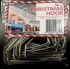 a package of christmas hooks with red and white stripes